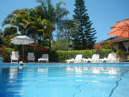 Pousada Mosaico Brasil - Maresias Отели рядом с достопримечательностью «Camping e Bar do Cacau - Praia de Santiago»