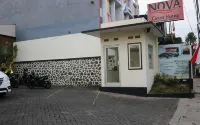 Nova Guesthouse Syariah - Kitchens