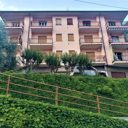 Charming Perledo Retreat with Lake View, Balcony & Parking