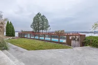Stunning Mid-Century Inspired Lake House, Private Pool, Jet-ski & Boat Dock!