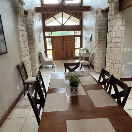 Charming 3-bedroom lake front house in fabulous Granbury with WiFi,  AC, Dock