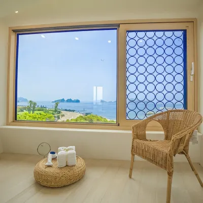 Jeju Backpaecus Villa โรงแรมใกล้หิน Jeolbuam Rock