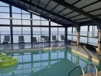 Sun & Sand Resort Oceanfront Suites Отели рядом с достопримечательностью «Пляж Сандбридж»