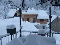 Lovely village house with a view of lake and mountain VAUJANY on the other side Alpe d'Huez