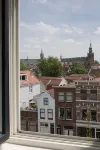 Canal house top floor in historic center Gouda