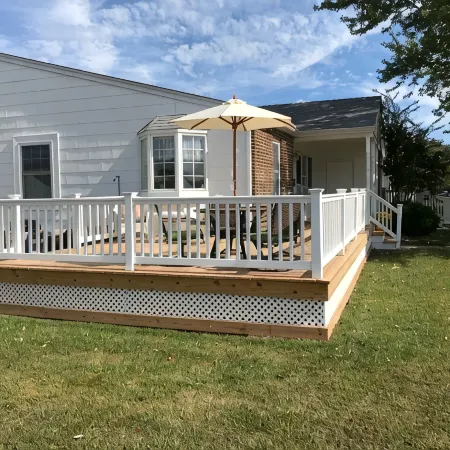 Beautiful corner property with cozy beach vibe.