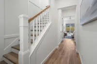 BRAND NEW 4-bedroom, 2 primary suites, heated pool, steps to the beach and river - 4-Star