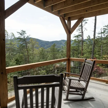 A Luxury Cabin with panoramic mountain views and 3 King Ensuites and Hot Tub!