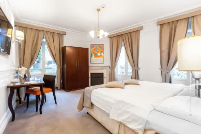 J5 Hotels Helvetie & la Brasserie Отели в г. Веито