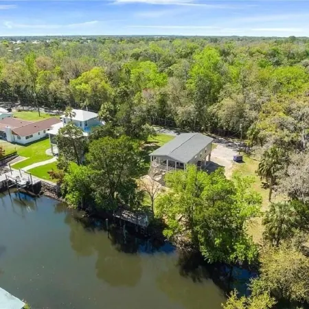 Waterfront home with dock and boat ramp