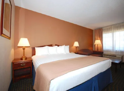 Magnuson Hotel Red Baron Hotels in Garden City