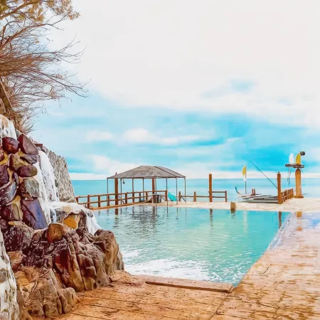 Dive and Trek Resort and Marine Sanctuary Отели рядом с достопримечательностью «Bauan Cockpit Arena»