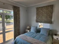 The Grace @ Pelican Bay is a delightful canal-side retreat located in Port Owen. - Homestays