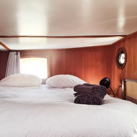 Charming captain's cabin on the historic ship De Hoop