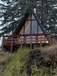 Romantic A-frame Cabin with Cedar Sauna, Private River and Scenic Views