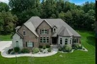 New!! Luxury Throughout. Sleeps 12. Just 5 Miles to ND. Theater. Bar. Hot Tub. Hotels in 