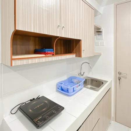 Warm and Simply Studio at Tokyo Riverside PIK 2 Apartment By Travelio