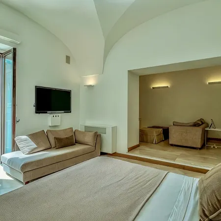 Santacroce Luxury Rooms Отели в г. Лечче