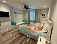 Custom 4-Bedroom Home w/Boat Slip, Private Fenced Backyard & Swimming Pool.