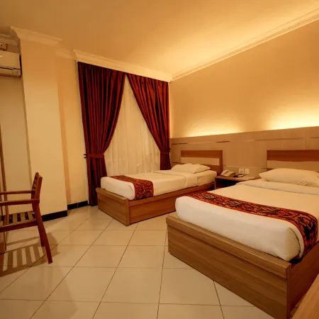 Kharisma Hotel Отели в г. Букиттинги