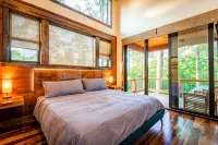 Ultimate Group Getaway: Modern Cabin w/ Hot Tub, Foosball, Playset & Arcade - 5-Star