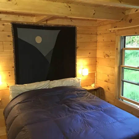 Isolated Log Cabin with Panoramic Views of Cherry Pond and White Mountains