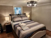Relaxing Riverfront, Private Dock, & Hot Tub - Wifi
