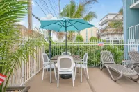 Coastal Palms Inn and Suites - Sea View