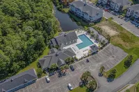 3 Bed 2 Bath Condo, 1 Mile to Beach, Sleeps 8  2X Pools, Golf, Gym, Elevator