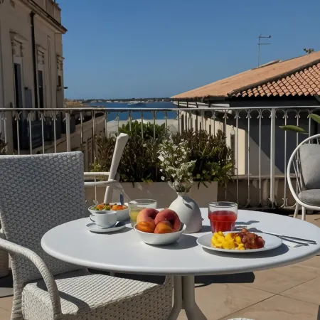 Hotel Palazzo Cavalieri Отели рядом с достопримечательностью «Ортиджия»