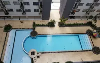 Roomy 2Br Apartment at Jarrdin Cihampelas Apartment by Travelio - Apartments