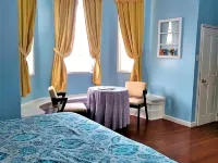 The Great House Inn Hotels near Sir Barry Bowen Municipal Airport