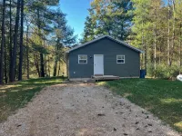 Charming 2-Bedroom Cabin on the River in Beaverton - 3-Star