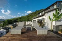 Tengchong Jingxin Valley Hot Spring Panoramic Inn (Heshun Ancient Town Branch) - سبا
