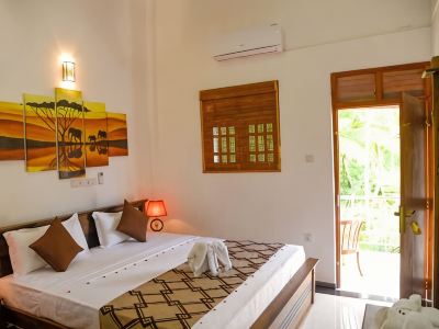 Villa in the middle of tropical palm trees, not far from the Bentota beach