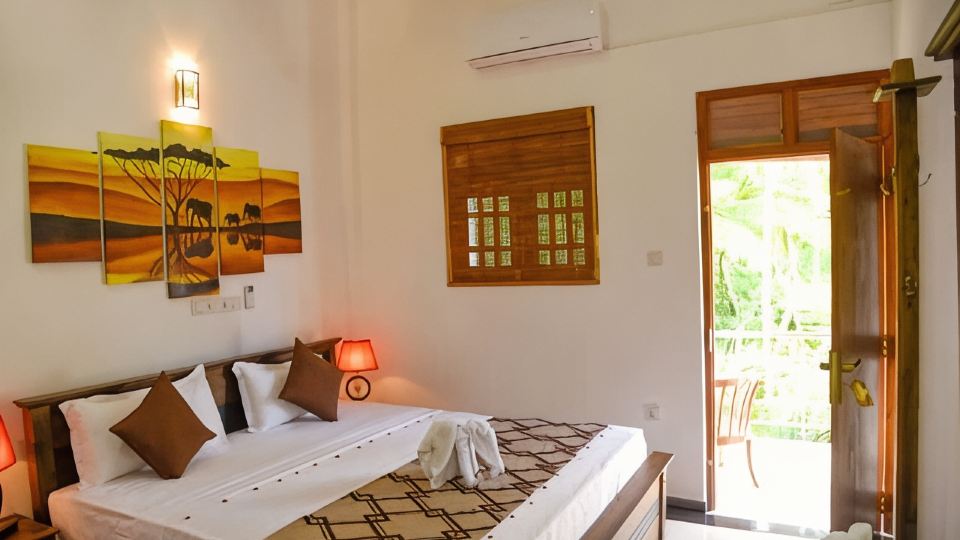 Villa in the middle of tropical palm trees, not far from the Bentota beach