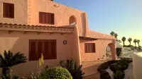 Luxury villa with private heated pool in private garden. Close to beaches.
