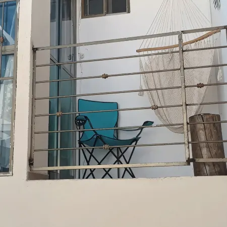 Linda casa con alberca y cascada.