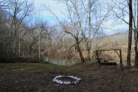 Cozy River front cabin w/Private natural spring. Pet Friendly!