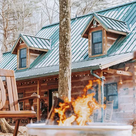 Modern luxury 4 Bedroom cabin with game room, hot tub, sauna and home theater