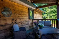 Majestic log home on 20 private acres near ski resort w/pool & hot tub