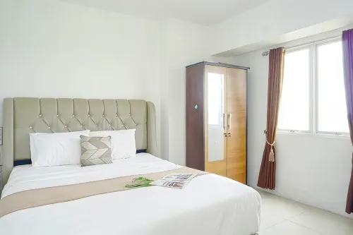 Cozy and Simple 1BR at Apartment Grand Sentraland Karawang By Travelio - Homestays