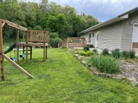 Private vacation house for larger groups near the Dells with heated game room.