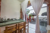 Traditional Sierra Leon Oceanfront Rooms - Kondo