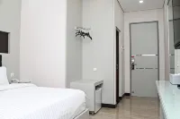 Hotel Helsinki Palu Hotel dekat Mawar Merah Kost