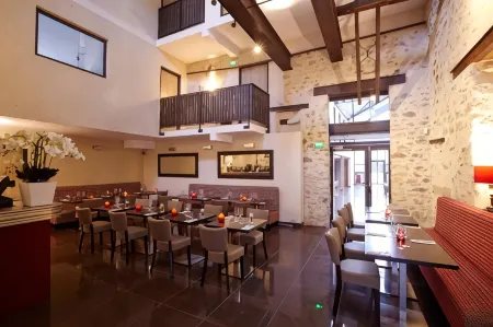 Hôtel les Herbes Folles Отели рядом с достопримечательностью «Espace Musée Aéroport Charles de Gaulle Terminal 2E»