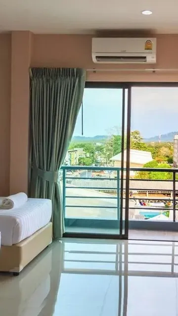 ห้องดีลักซ์ เตียงใหญ่ 1 เตียง