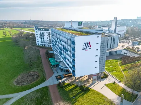 Maseven Stuttgart SI Centrum Ehem SI-Suites Отели в г. Штутгарт