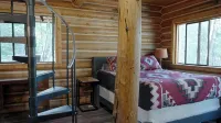 Cozy cabin bordering forest service trails. Perfect escape on 10 acres of forest