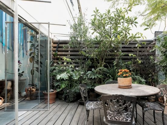 Marvelous, Art-Filled Loft with a Garden Terrace